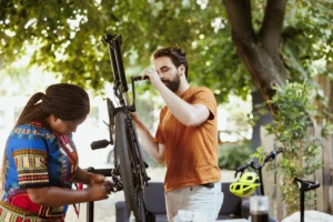 NGO volunteers working with a bicycle during a community activity, featured in Development Sector Films highlighting social sector work.