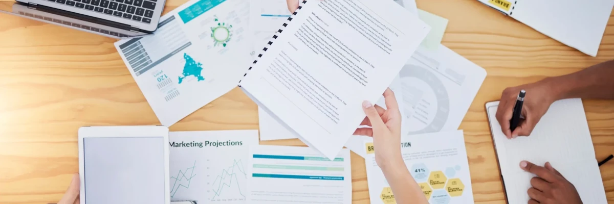 team discussing Best Practices For Creating Effective Nonprofit Annual Reports